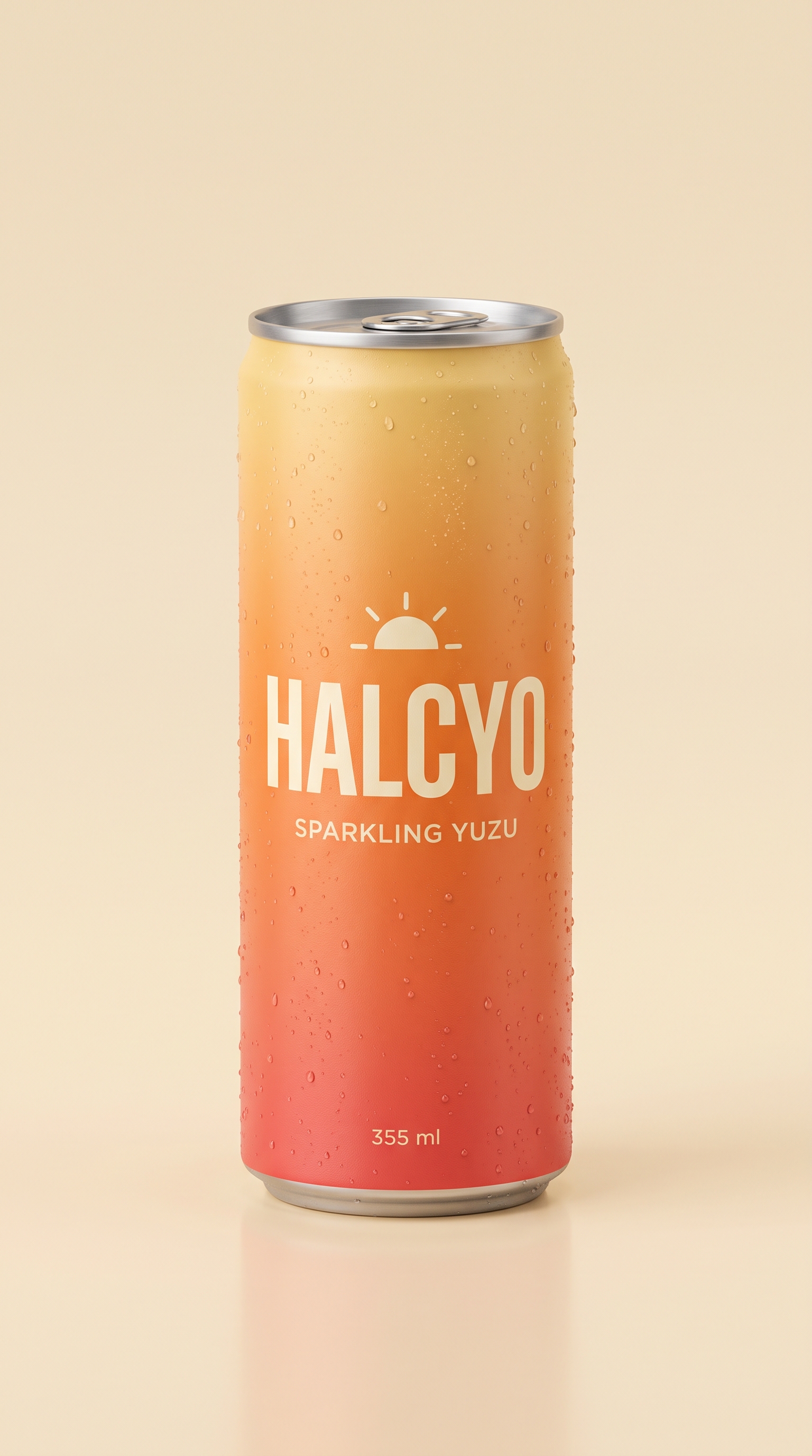 HALCYO Sparkling Yuzu can with condensation on a cream studio background